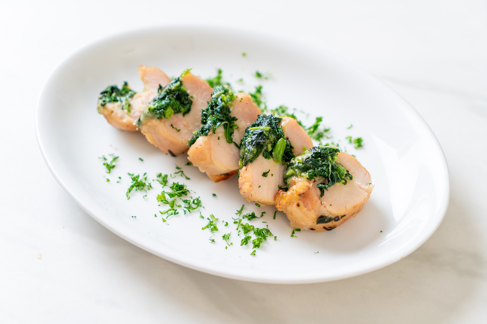 Close-up of seared scallop with microgreens